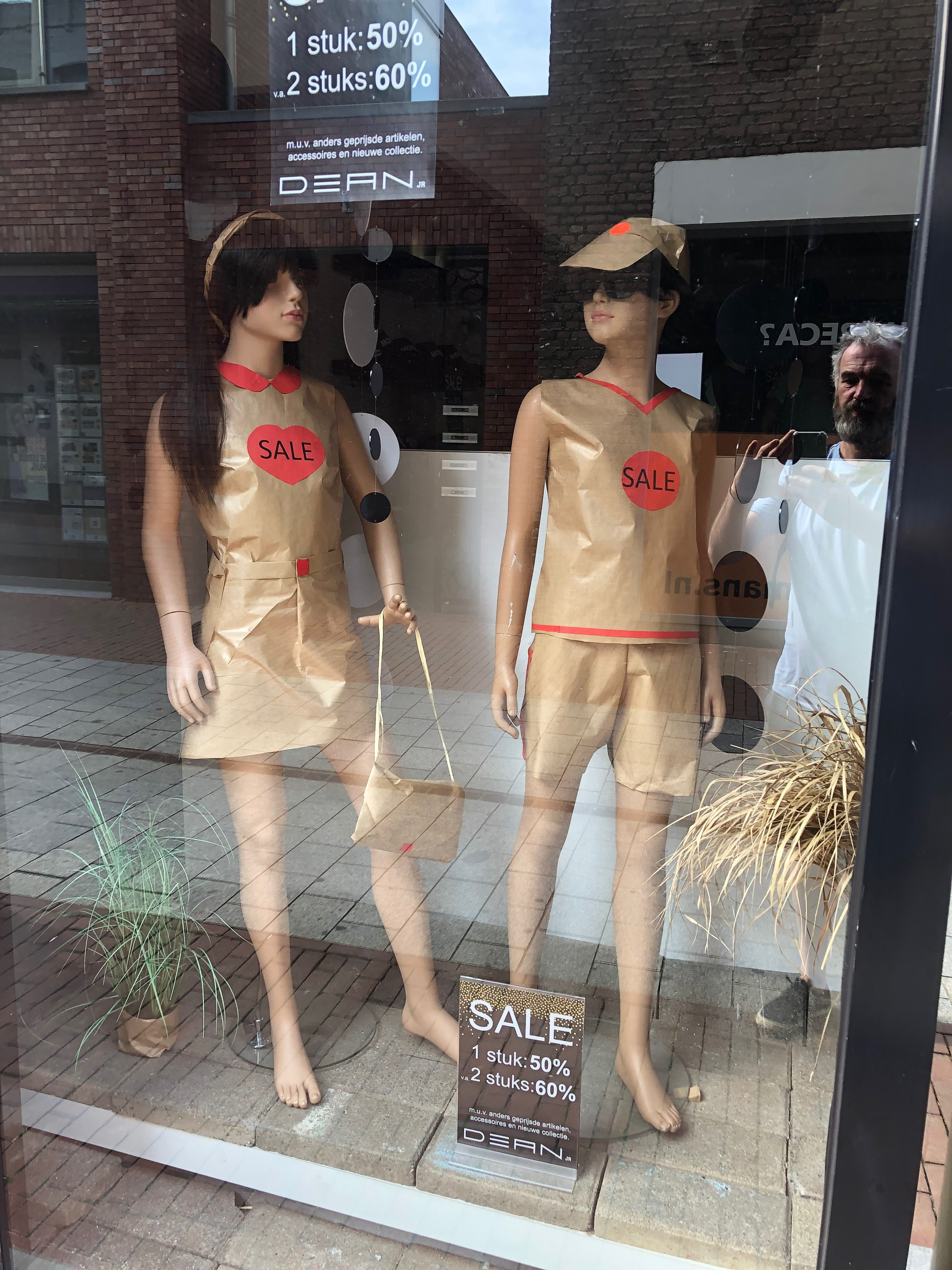 "Less is more..." (window mannequins in wrapping paper)